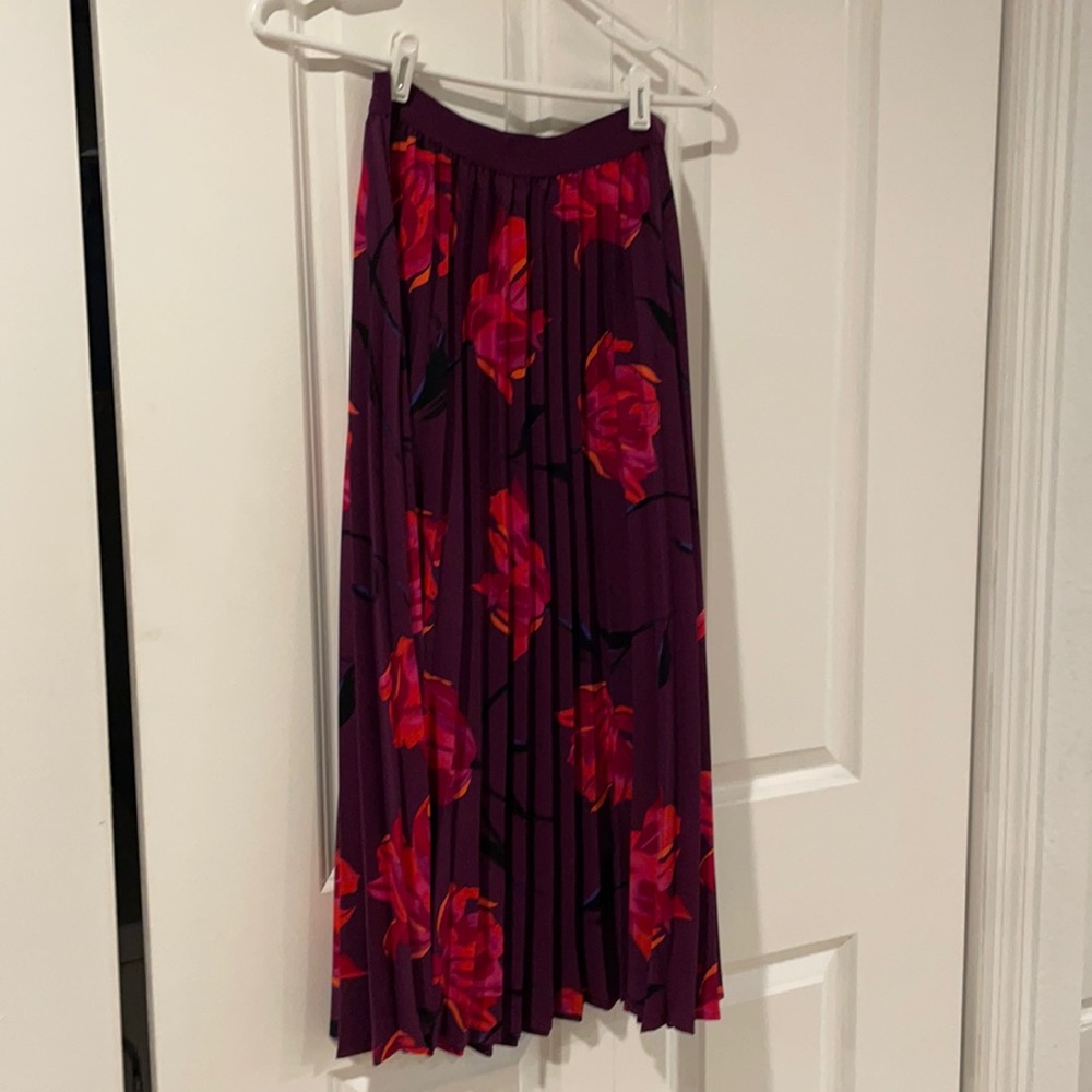 Maroon pleated skirt with floral pattern